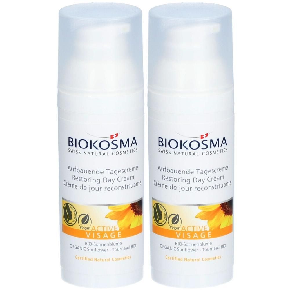 Deux crèmes blanches avec couvercles transparents. Inscription: BIOKOSMA, Crème de jour, Active Visage, tournesol. Certifié.