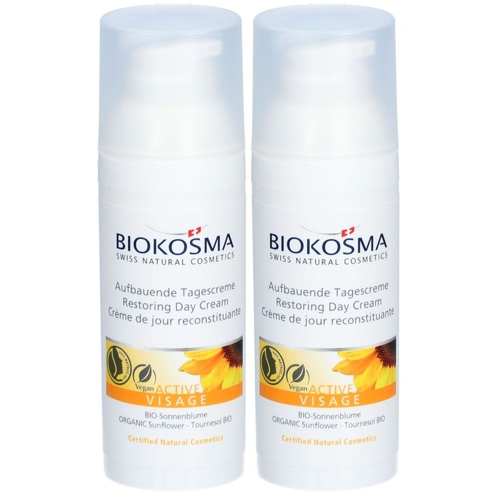 Deux crèmes blanches avec couvercles transparents. Inscription: BIOKOSMA, Crème de jour, Active Visage, tournesol. Certifié.