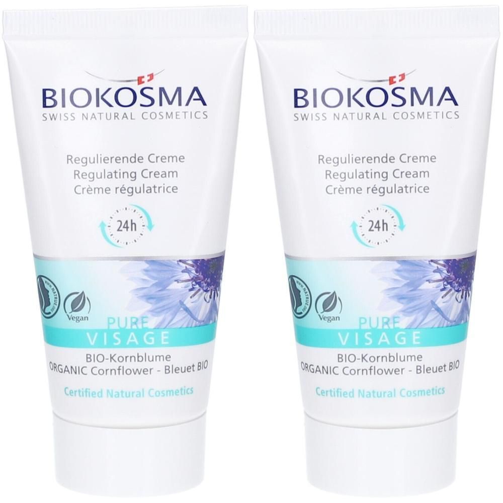 Deux tubes de crème BIOKOSMA Pure Visage. Tubes blancs avec texte et logo bleus. Texte: Crème régulatrice, 24h, Pure Visage.