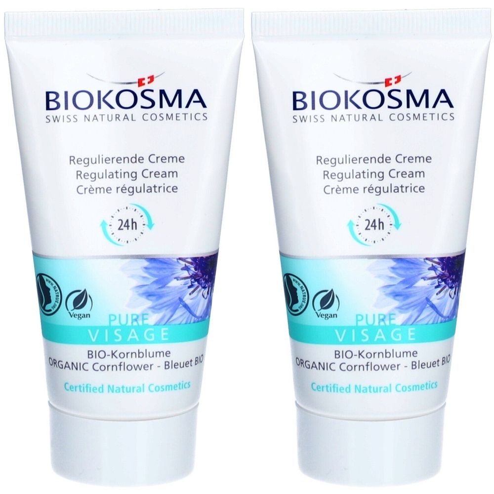 Deux tubes de crème BIOKOSMA Pure Visage. Tubes blancs avec texte et logo bleus. Texte: Crème régulatrice, 24h, Pure Visage.