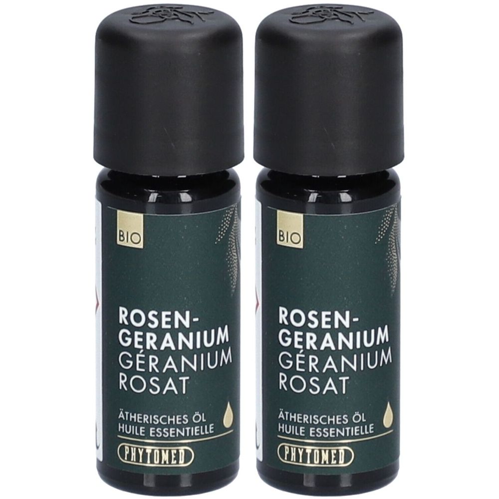 Deux flacons d'huile essentielle. Bouchons noirs, étiquettes vertes avec texte: Rosen-Geranium, label BIO, PHYTOMED.