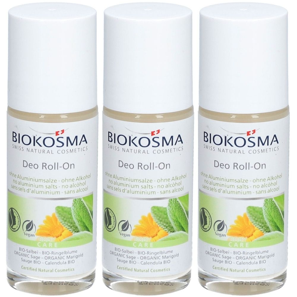 Drie roll-on deodorants met witte dop. Opschrift: BIOKOSMA, Deo Roll-On, zonder aluminiumzouten. Vegan-zegel en bloemenillustratie.