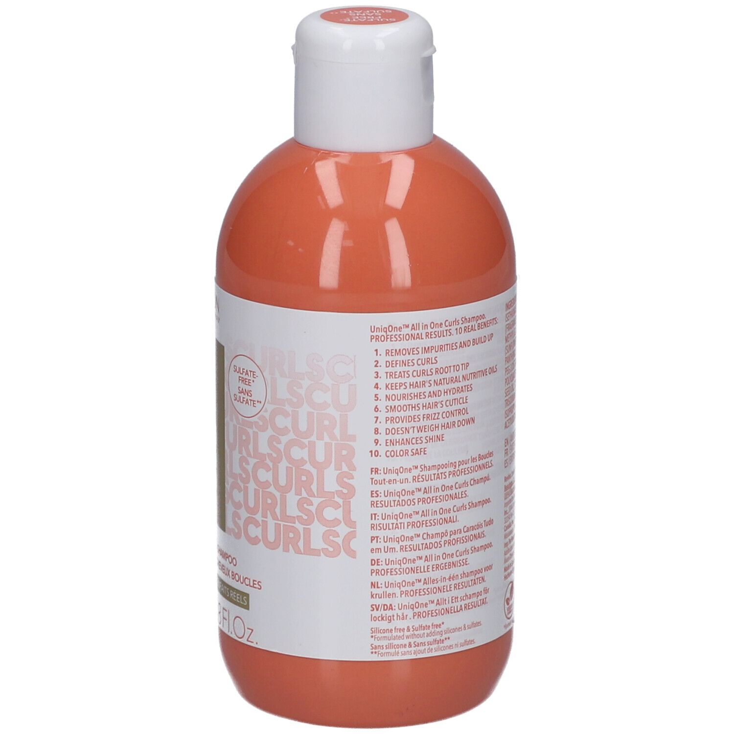 Dos d'un flacon orange avec bouchon blanc. Inscription: UniqOne Curls Shampoo. 10 avantages. Texte.