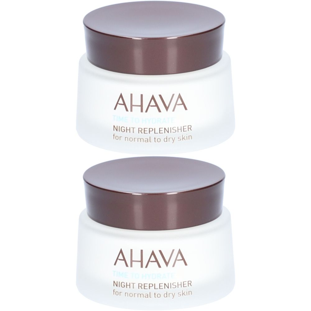 Deux pots de crème de nuit AHAVA. Pots blancs avec couvercles marron. Inscription: AHAVA, Night Replenisher pour peaux normales à sèches.