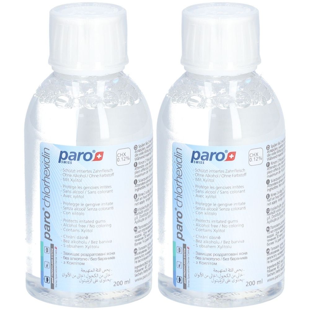Twee flessen mondwater met witte dop. Opschrift: paro chlorhexidine, CHX 0,12%.