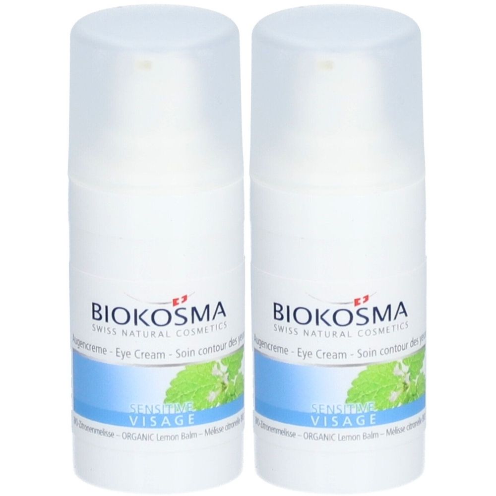Twee witte flacons Biokosma oogcrème. Opschrift: Eye Cream, Sensitive Visage. Met afbeelding van bladeren.