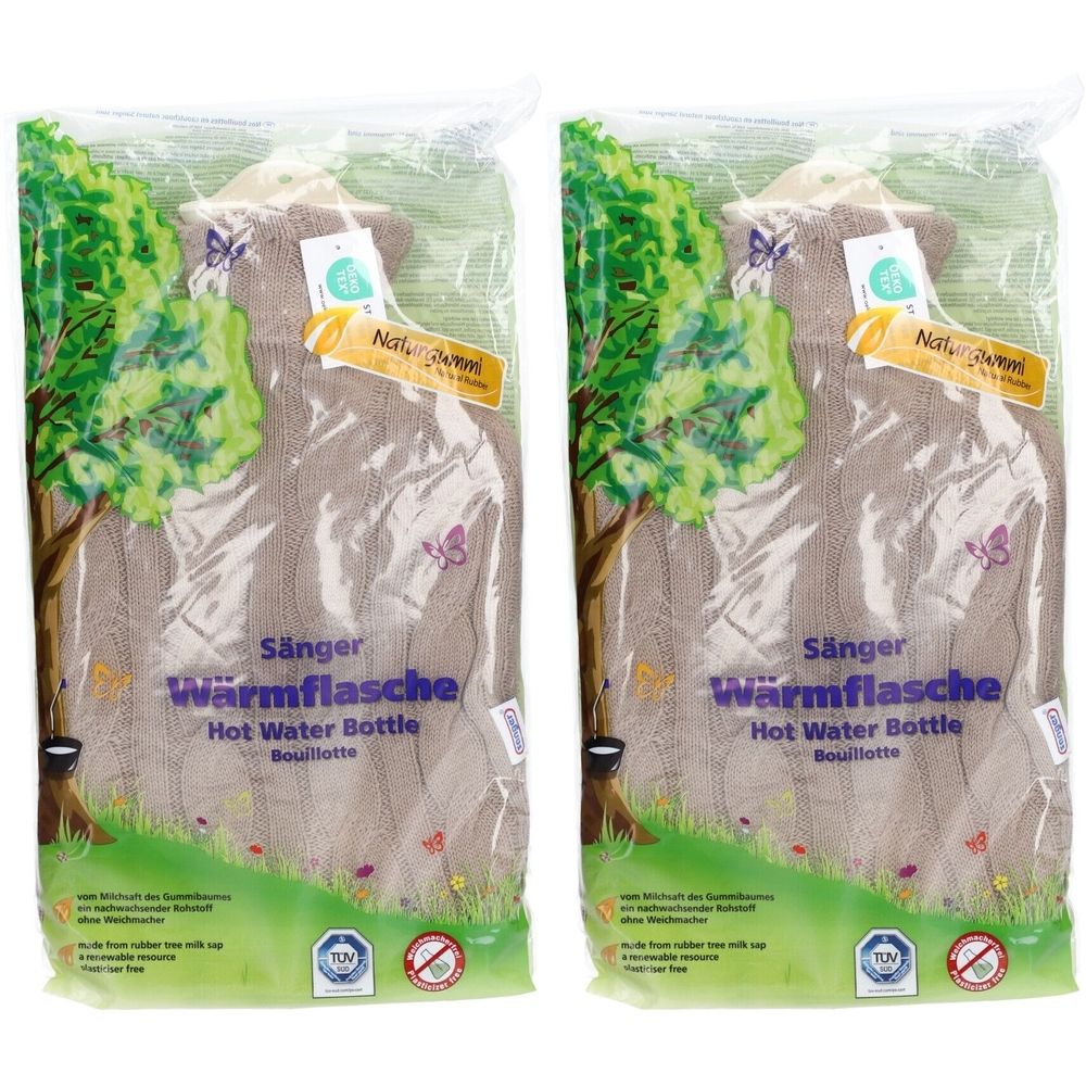 Twee kruiken in plastic verpakking. Opschrift: Sänger Wärmflasche, Hot Water Bottle. Boom- en vlindermotief.