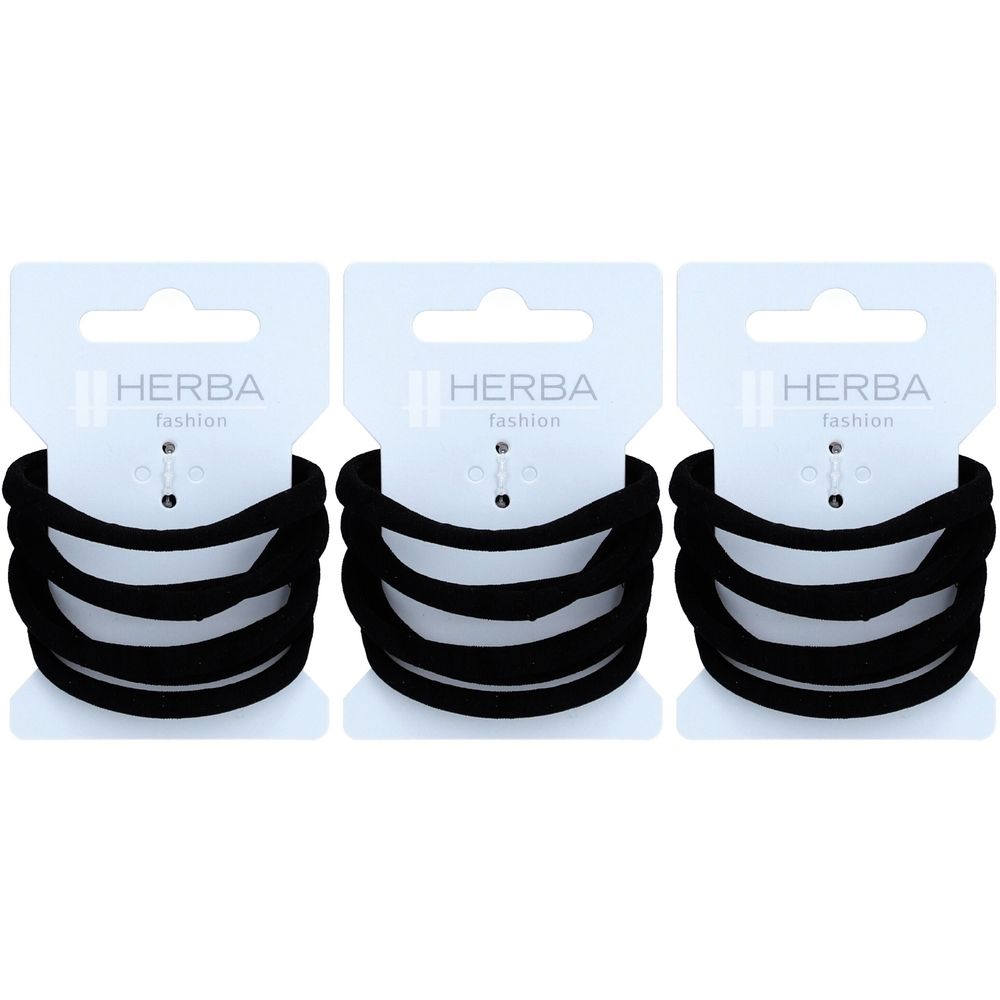 Trois paquets d'élastiques noirs. Chaque paquet contient plusieurs élastiques et porte le nom de la marque Herba.