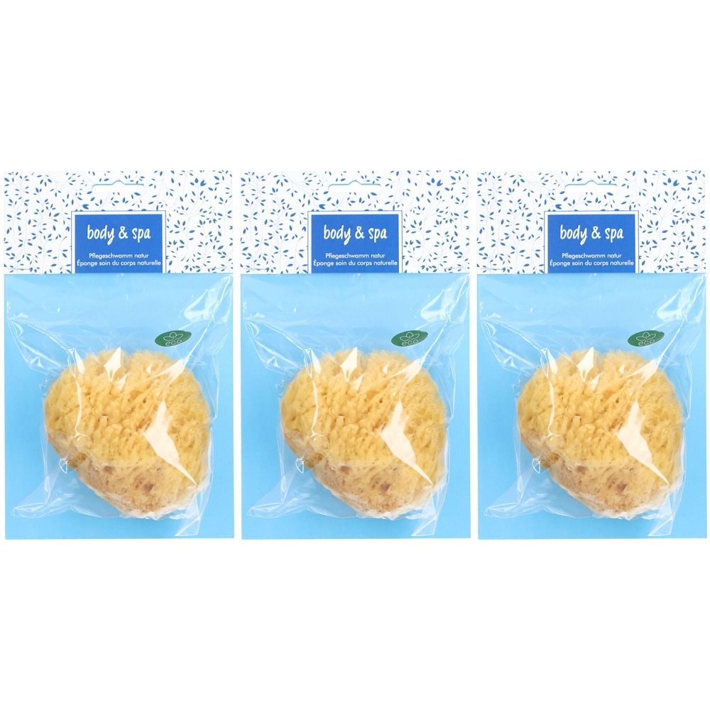 Trois éponges naturelles dans un emballage plastique. Inscription "body & spa".