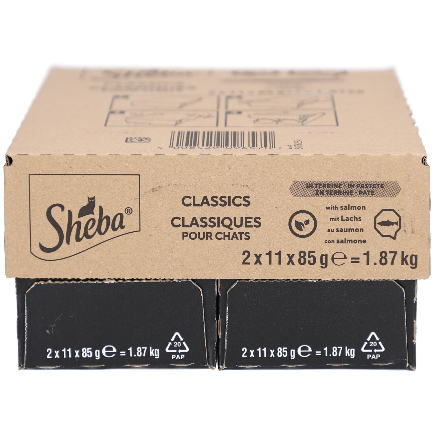 Katvoer in achthoekige bak. Opschrift "Sheba Classics". Met zalm. Illustratie van kat en vislogo. Inhoud 85g.