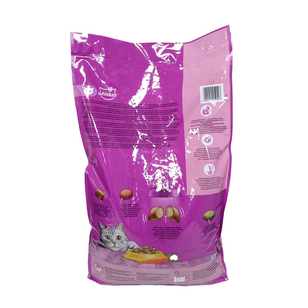 Achterkant van de WHISKAS 1+ DROOG ADULT KIP verpakking. Paarse zak met tekst en illustraties. Barcode zichtbaar.