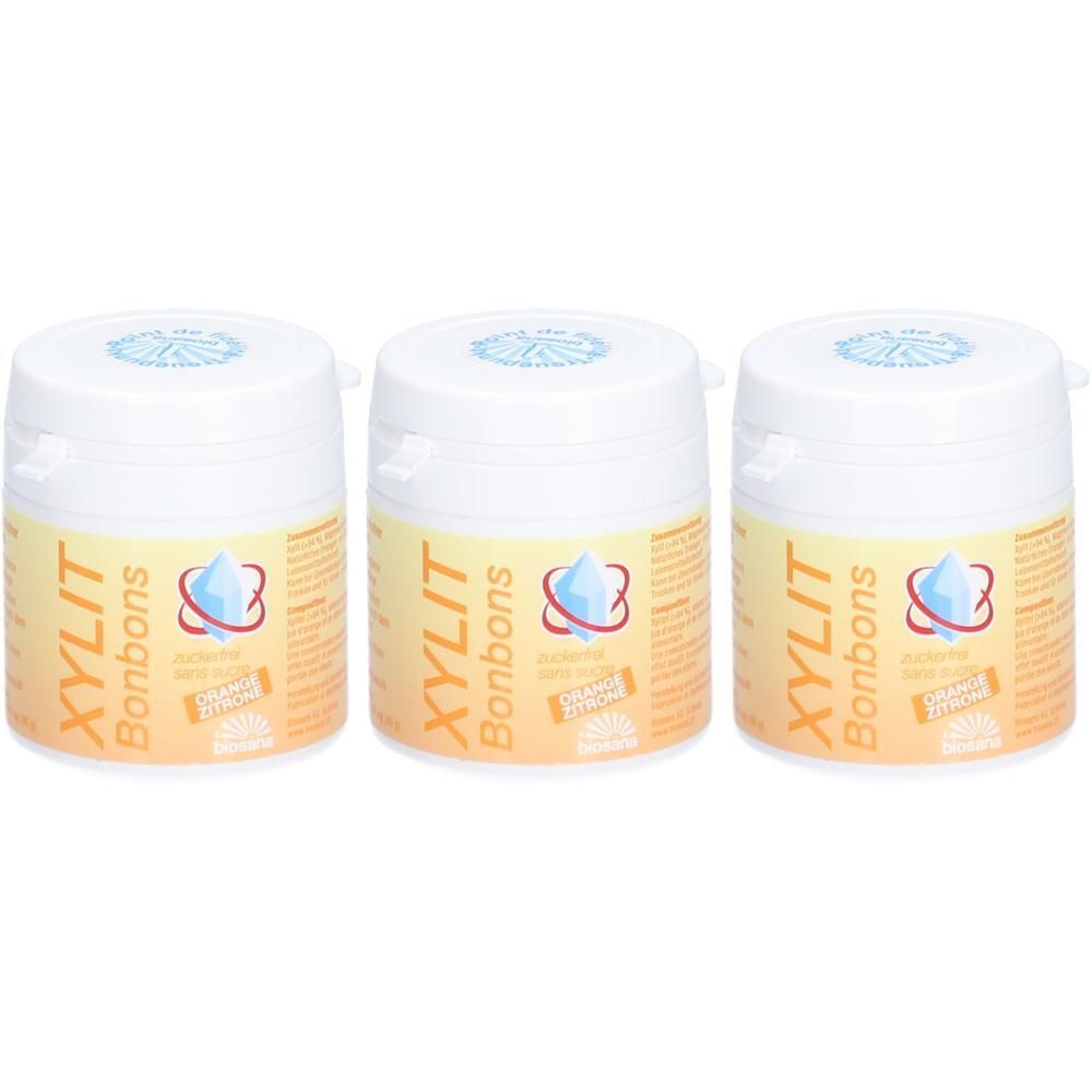 Drie potjes XYLIT Bonbons Sinaasappel/Citroen. Witte potjes met oranje-geel etiket.