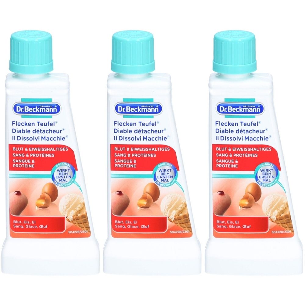 Drie flessen Dr. Beckmann Flecken Teufel. Witte flessen met turquoise doppen. Opschrift: Flecken Teufel, Bloed & Eiwit, SANG & PROTEINES.
