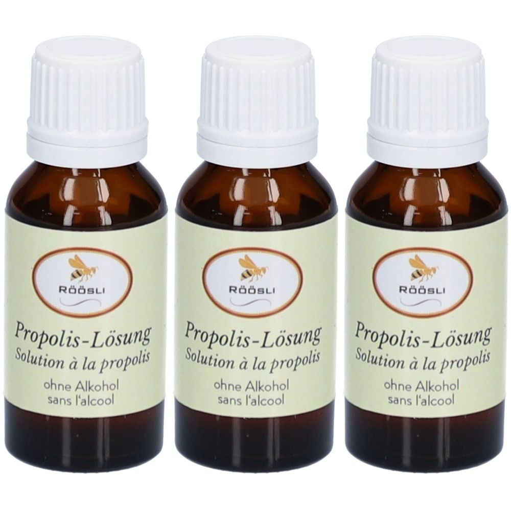 Trois flacons bruns avec bouchons blancs. Inscription: Propolis-Lösung sans alcool. Marque: RÖÖSLI.