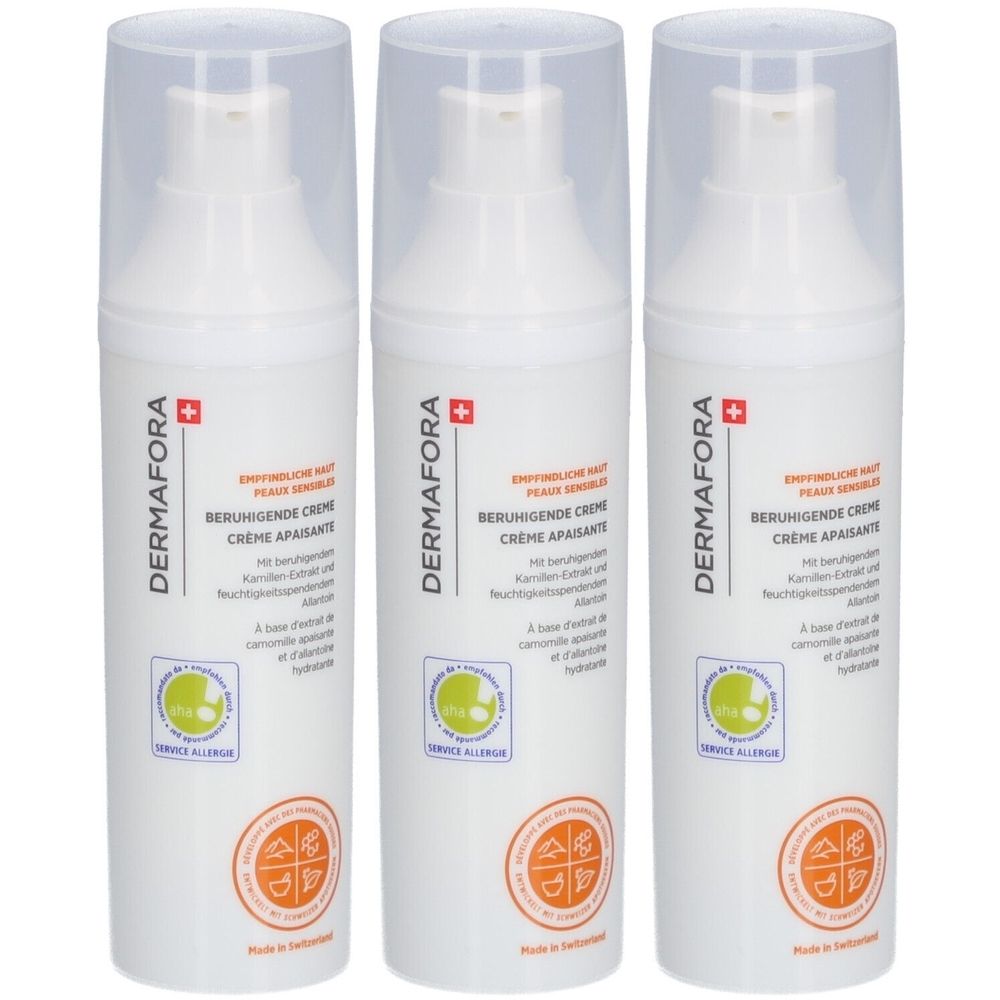 Drie witte flessen met transparante doppen. Opschrift: DERMAFORA, Beruhigende Creme, Creme Apaisante. Logo's en keurmerken.