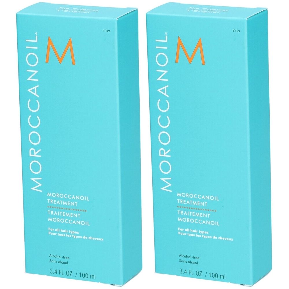 Deux boîtes turquoise avec le mot MOROCCANOIL et la lettre M. Texte: TREATMENT, TRAITEMENT, MOROCCANOIL. Sans alcool, pour tous types de cheveux.