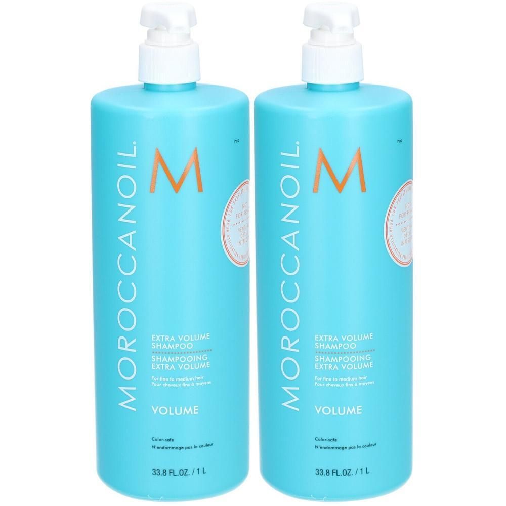 Twee turquoise pompflesjes Moroccanoil Extra Volume Shampoo.