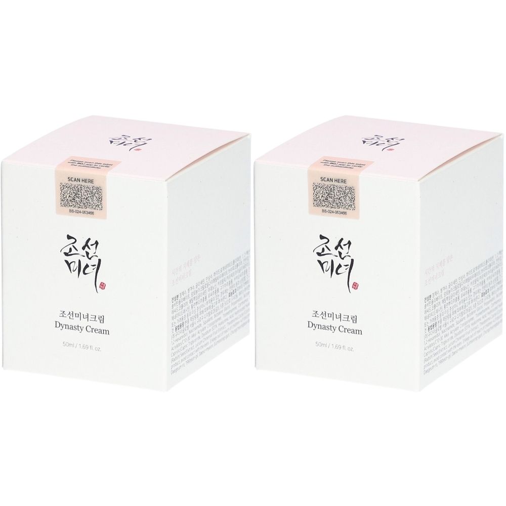 Twee vierkante, witte productverpakkingen met roze deksels. Koreaanse en Engelse tekst op de voorkant, waaronder "Dynasty Cream". QR-code sticker zichtbaar.