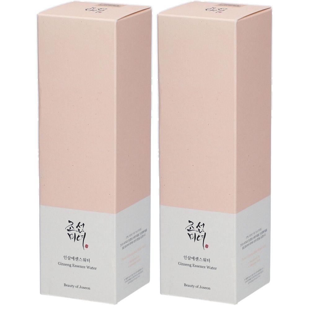 Deux boîtes rectangulaires roses. Texte coréen et "Ginseng Essence Water" sur la partie inférieure blanche.