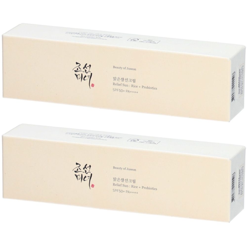 Twee crèmekleurige rechthoekige productverpakkingen. Opschrift: Beauty of Joseon, Relief Sun Rice Probiotics SPF50+.