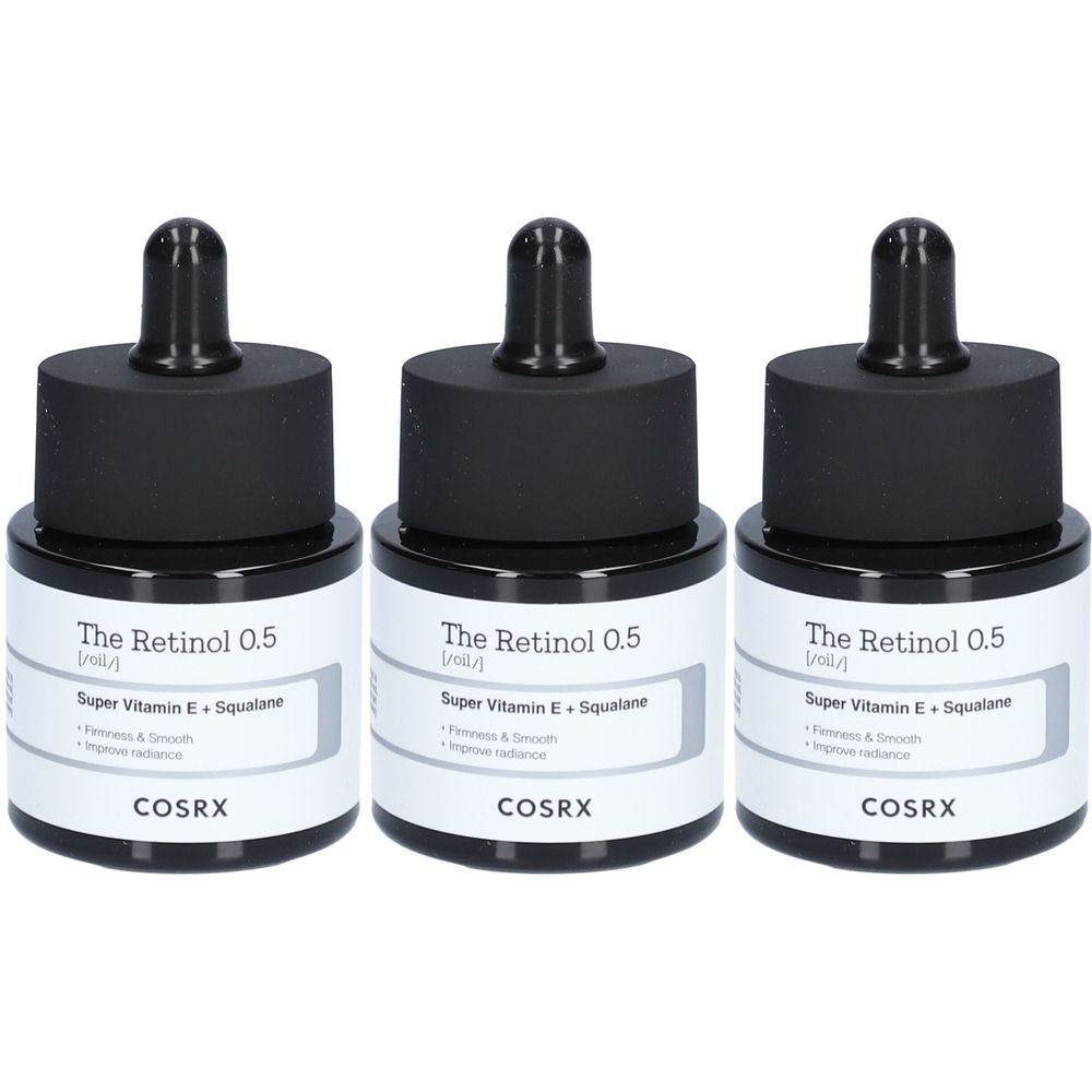 Trois flacons avec bouchons noirs et étiquettes. Inscription : The Retinol 0.5, Super Vitamin E + Squalane, COSRX.