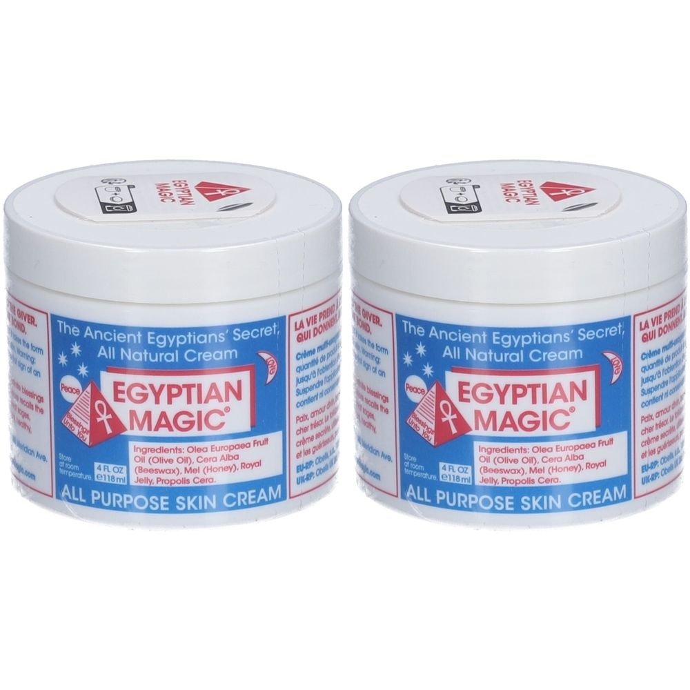 Deux pots blancs avec couvercles. Inscription : Egyptian Magic, All Purpose Skin Cream. Étiquettes bleues et rouges.