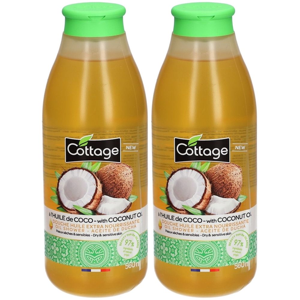 Twee flessen douche-olie met kokosolie. Groene dop, gele vloeistof. Merk: Cottage. Opschrift: Douche Huile Extra Nourrissante.