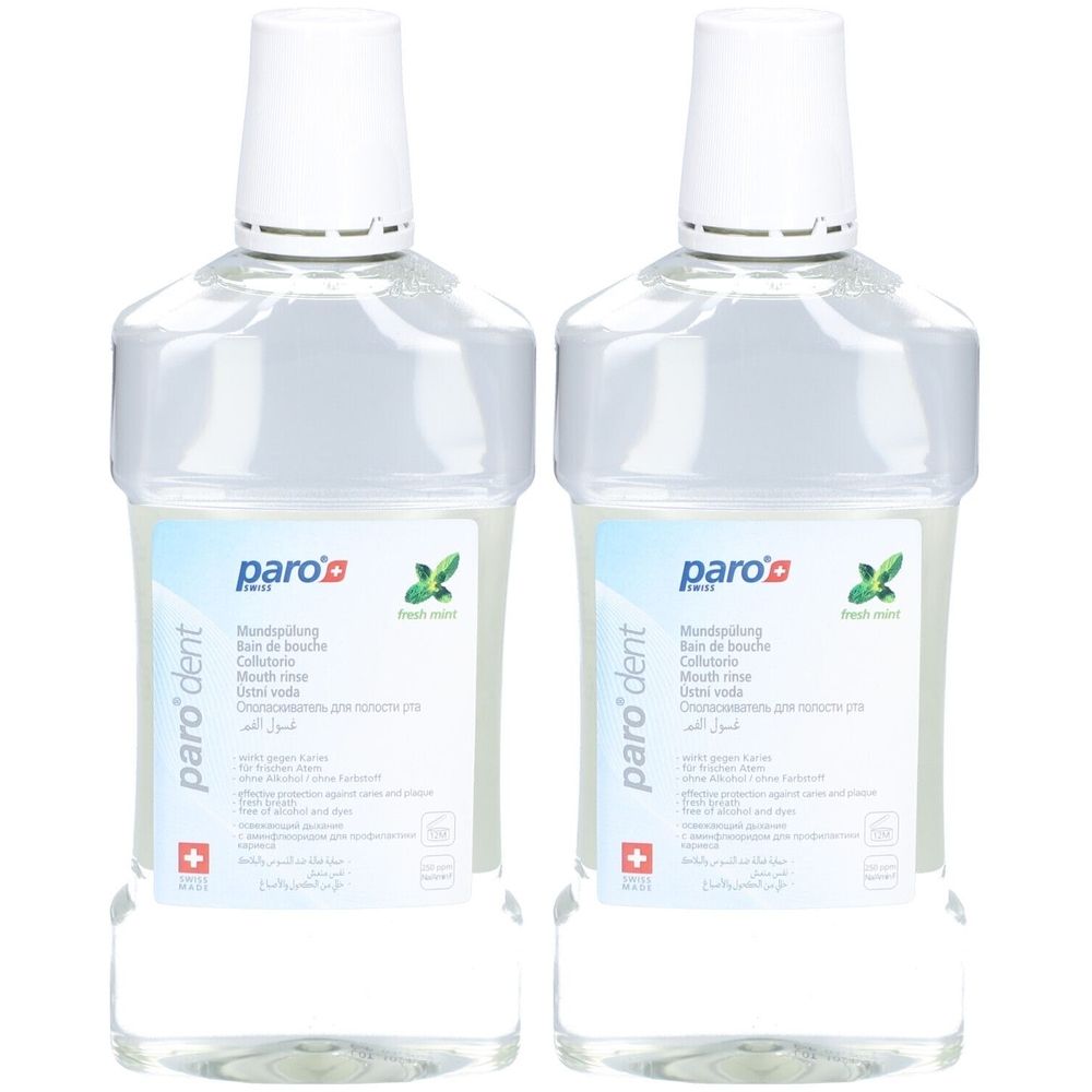 Twee transparante flessen met witte dop. Labels met "paro dent" en "fresh mint". Zwitsers kruis.