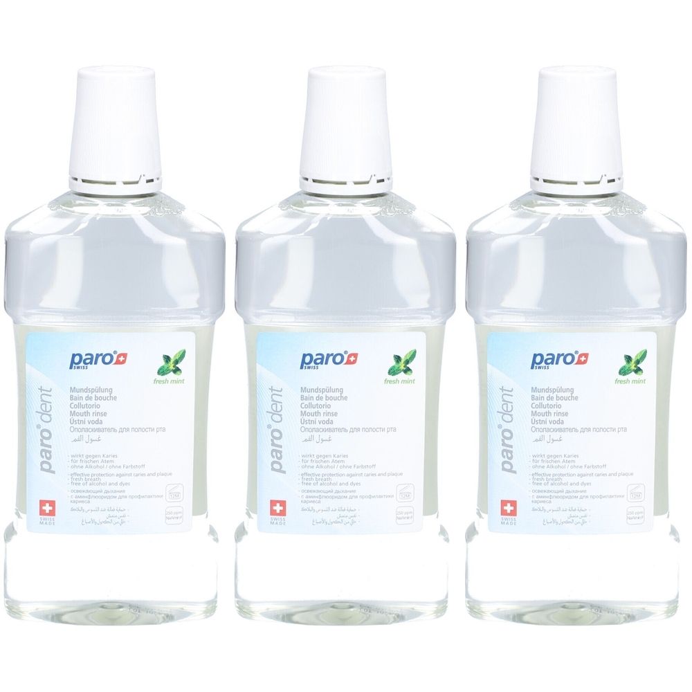 Drie flessen paro® dent mondwater. Heldere vloeistof in transparante flessen met witte doppen. Bedrukking met productinformatie.