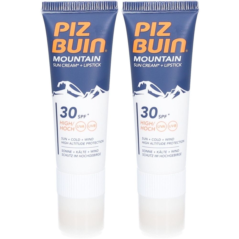 Twee tubes PIZ BUIN Mountain zonnecrème + lippenbalsem SPF30. Blauw-witte verpakking met tekst en bergmotief.