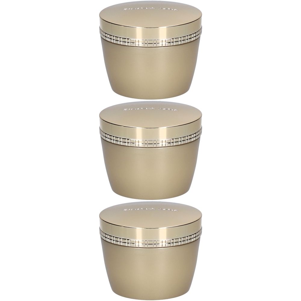 Drie crèmekleurige potten met gouden deksels. Op het deksel is een zilveren band te zien. De pot heeft een ronde vorm.