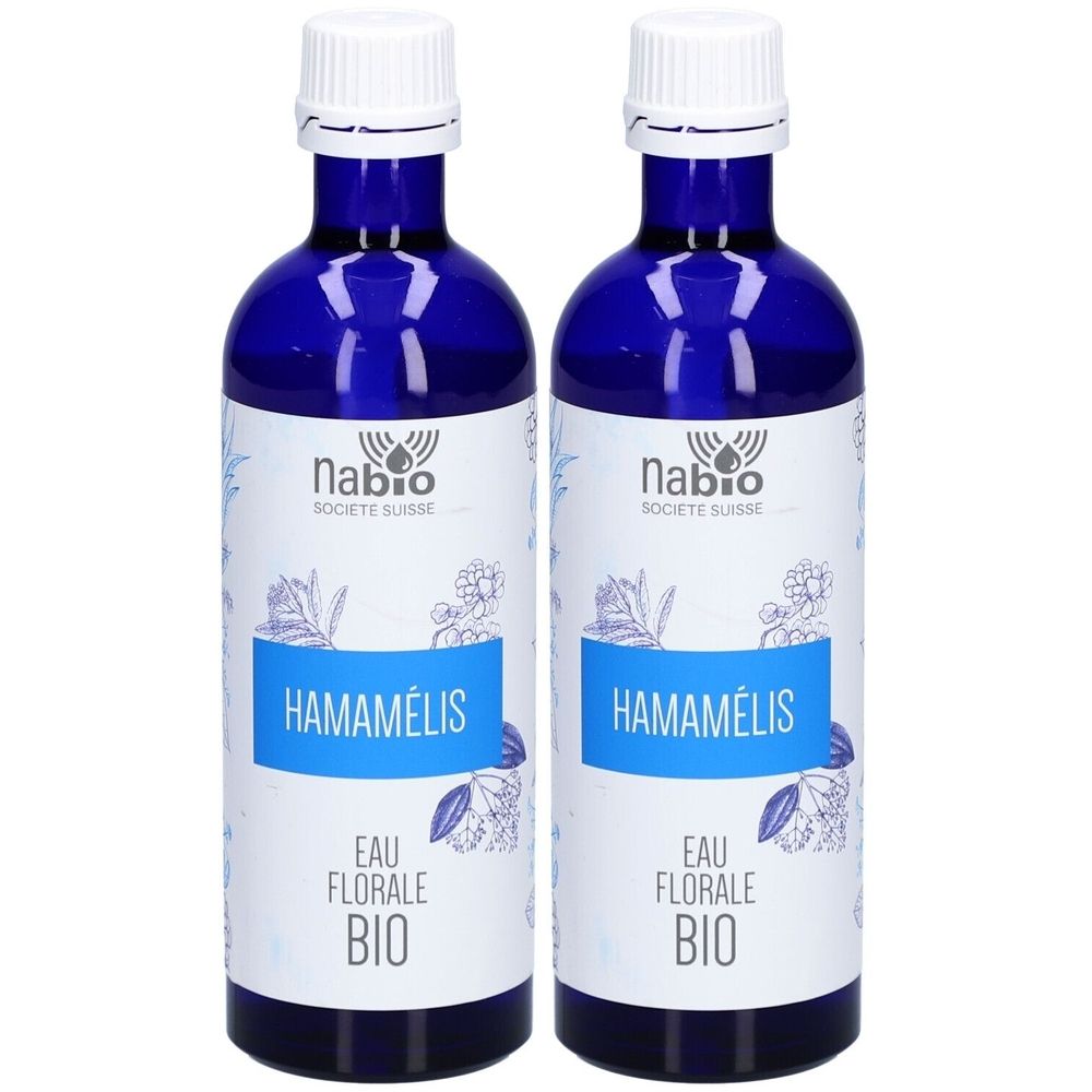 Deux flacons en verre bleu avec étiquette blanche. Inscription: Hamamélis Eau Florale Bio. Marque: Nabio.