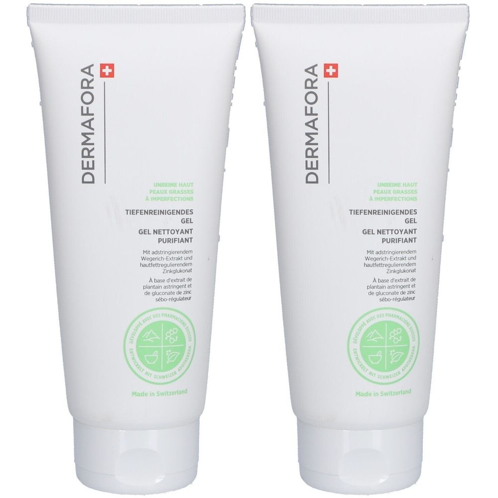Twee witte tubes met groene opdruk. Op elke tube staat "DERMAFORA" en "Tiefenreinigendes Gel". Zwitserse kwaliteit.