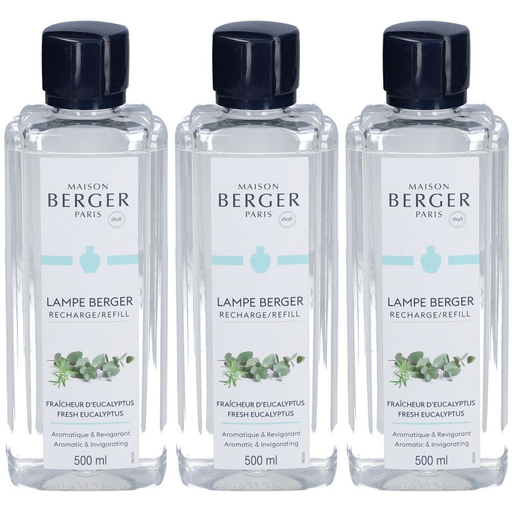 Drie flessen met zwarte doppen. Het etiket toont "MAISON BERGER PARIS" en "LAMPE BERGER RECHARGE/REFILL".