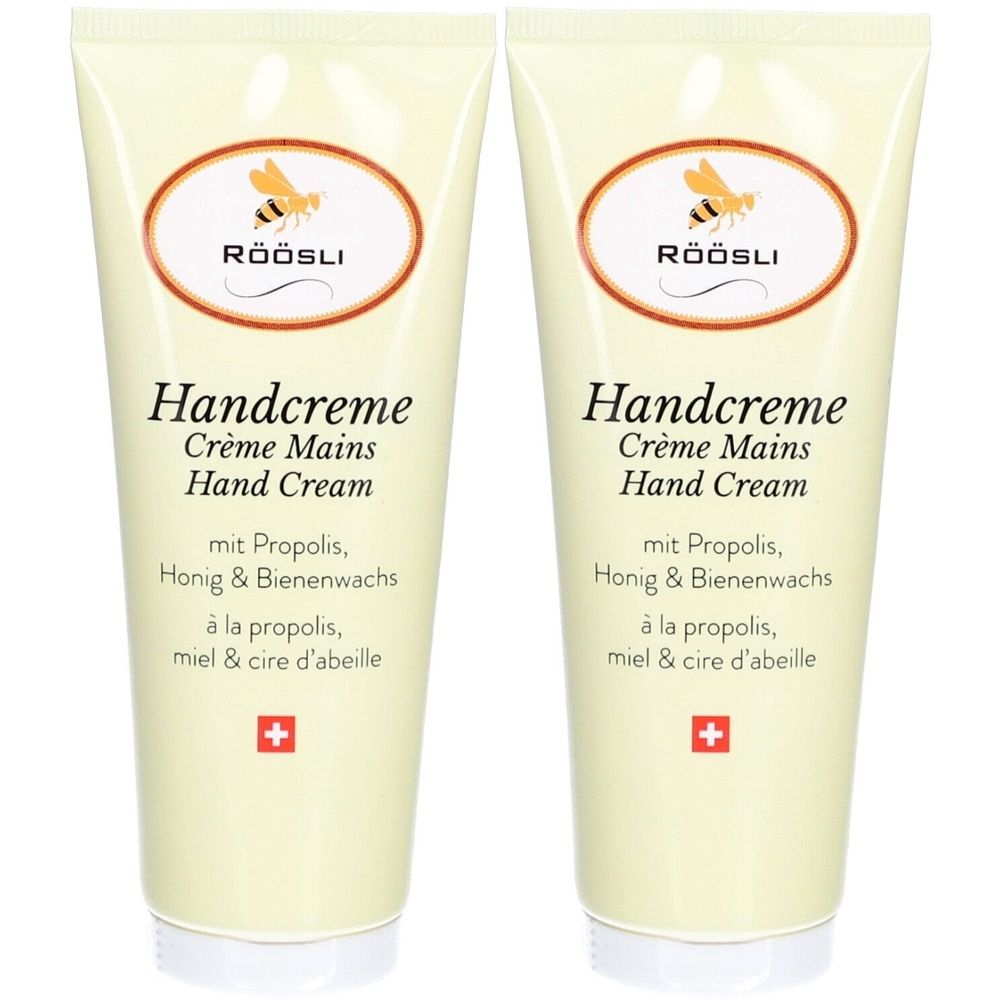 Deux tubes de crème pour les mains. Inscription: Handcreme, Crème Mains, Hand Cream. Avec propolis, miel et cire d'abeille. Croix suisse.