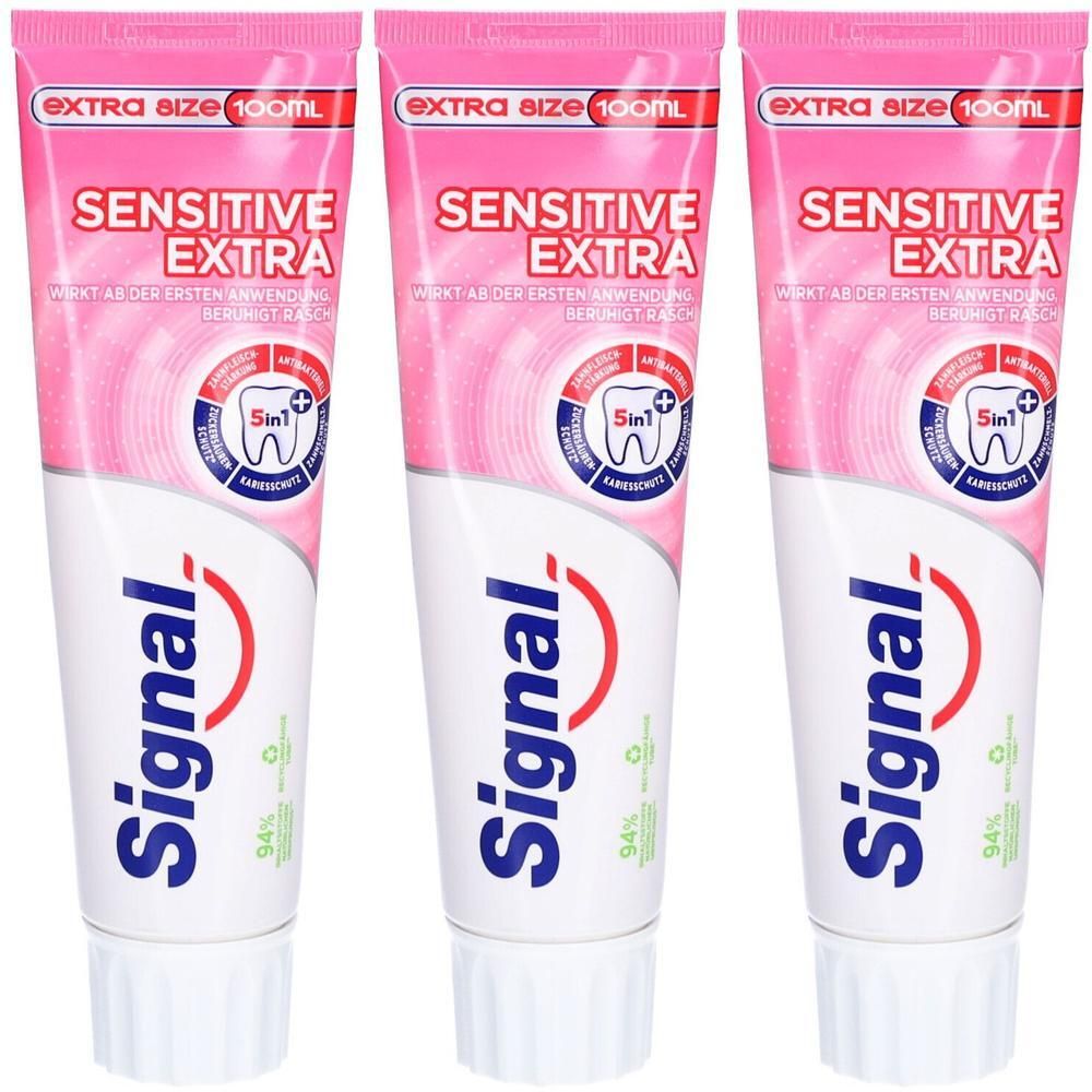 Drie tubes tandpasta Signal Sensitive Extra. Roze-wit ontwerp, tekst en logo. Extra Size 100ml.