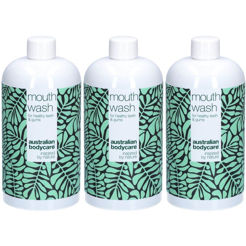 Drie flessen mondwater. Wit met groen bladpatroon. Opschrift: Mouth Wash, Australian Bodycare.