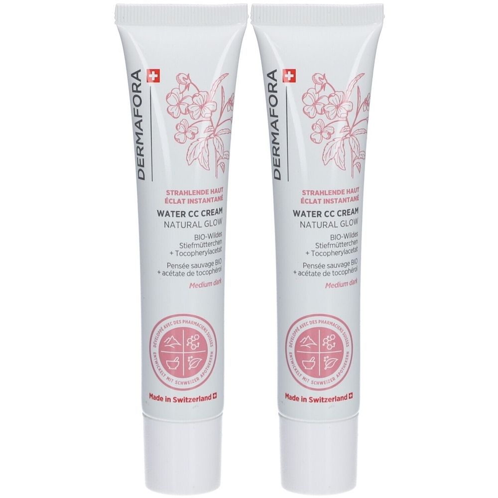 Twee tubes Dermafora Water CC Cream Medium. Witte tubes met productnaam, bloemmotief en Zwitsers kruis. Opschrift: Made in Switzerland.