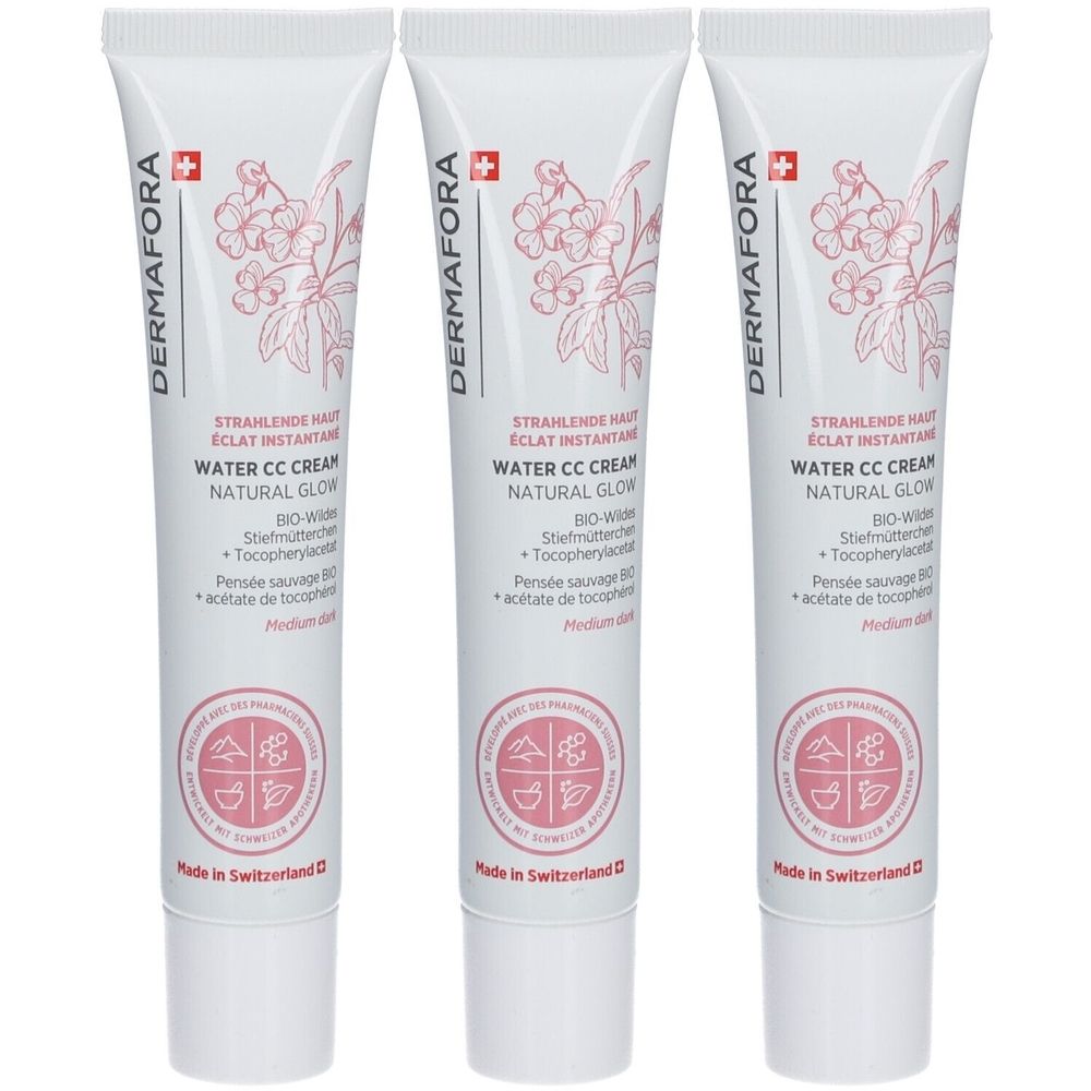 Drie tubes Dermafora Water CC Cream. Witte tubes met productnaam, logo en bloemmotief. Gemaakt in Zwitserland.