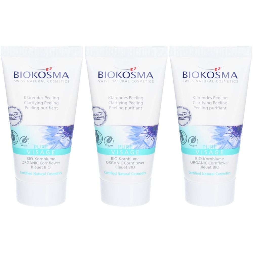 Trois tubes de BIOKOSMA PURE Visage Soft Peeling. Tubes blancs avec texte bleu et motif floral. Label vegan.