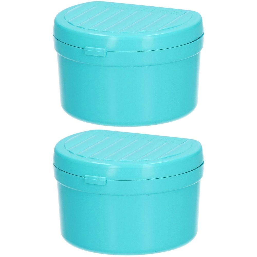 Deux boîtes à dents de couleur turquoise avec couvercles et fermetures. Les couvercles ont une surface rainurée.