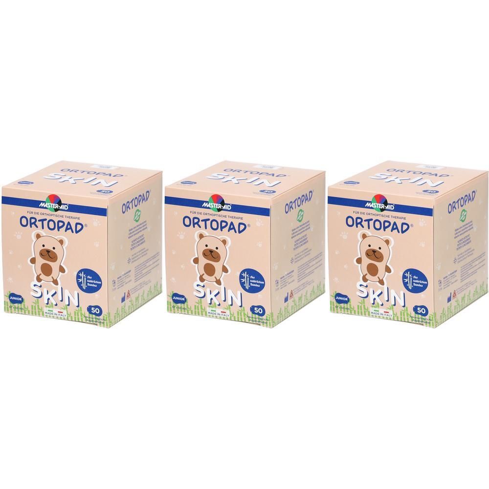 Drie pakken Ortopad Junior Skin oogpleisters, elk met 50 stuks. De verpakking toont een beer en is voor kinderen.