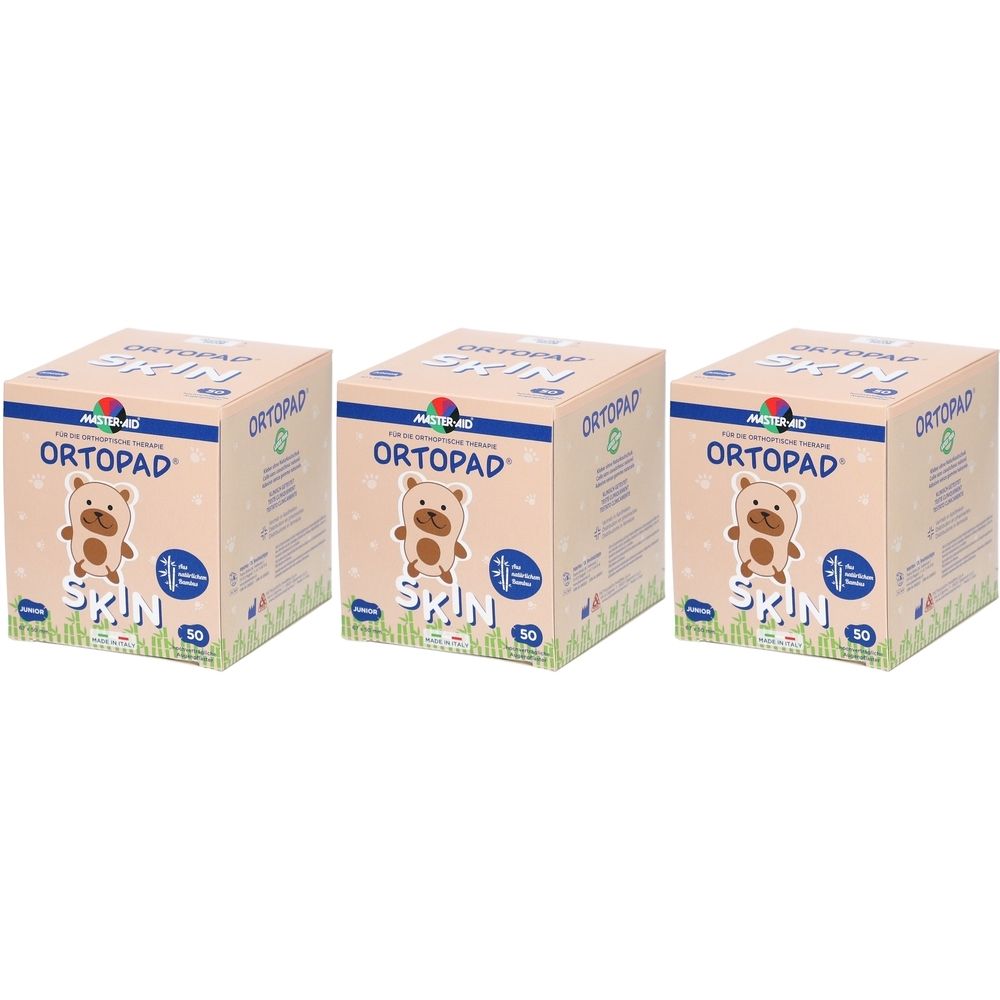 Drie pakken Ortopad Junior Skin oogpleisters, elk met 50 stuks. De verpakking toont een beer en is voor kinderen.