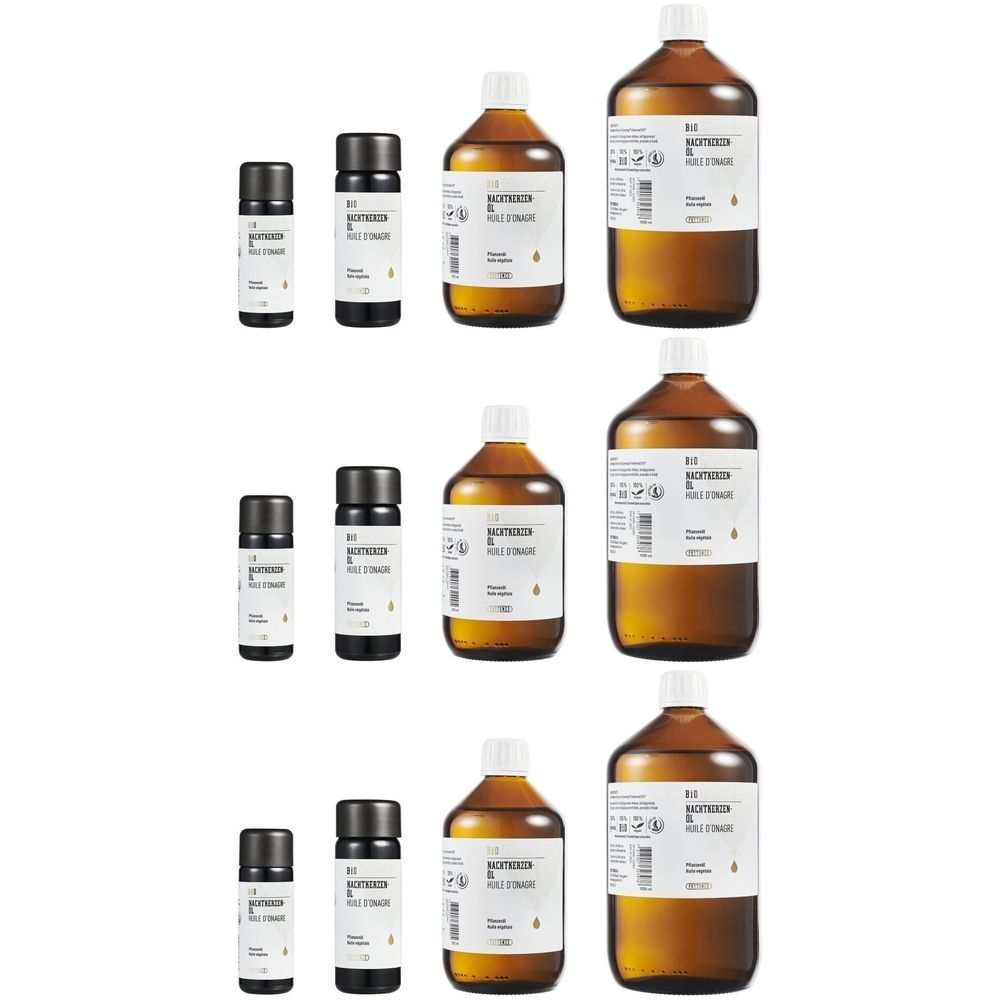 Verschillende flessen en kleine flesjes. Opschrift: Bio-teunisbloemolie. Bruine glazen flessen met witte etiketten en zwarte doppen.