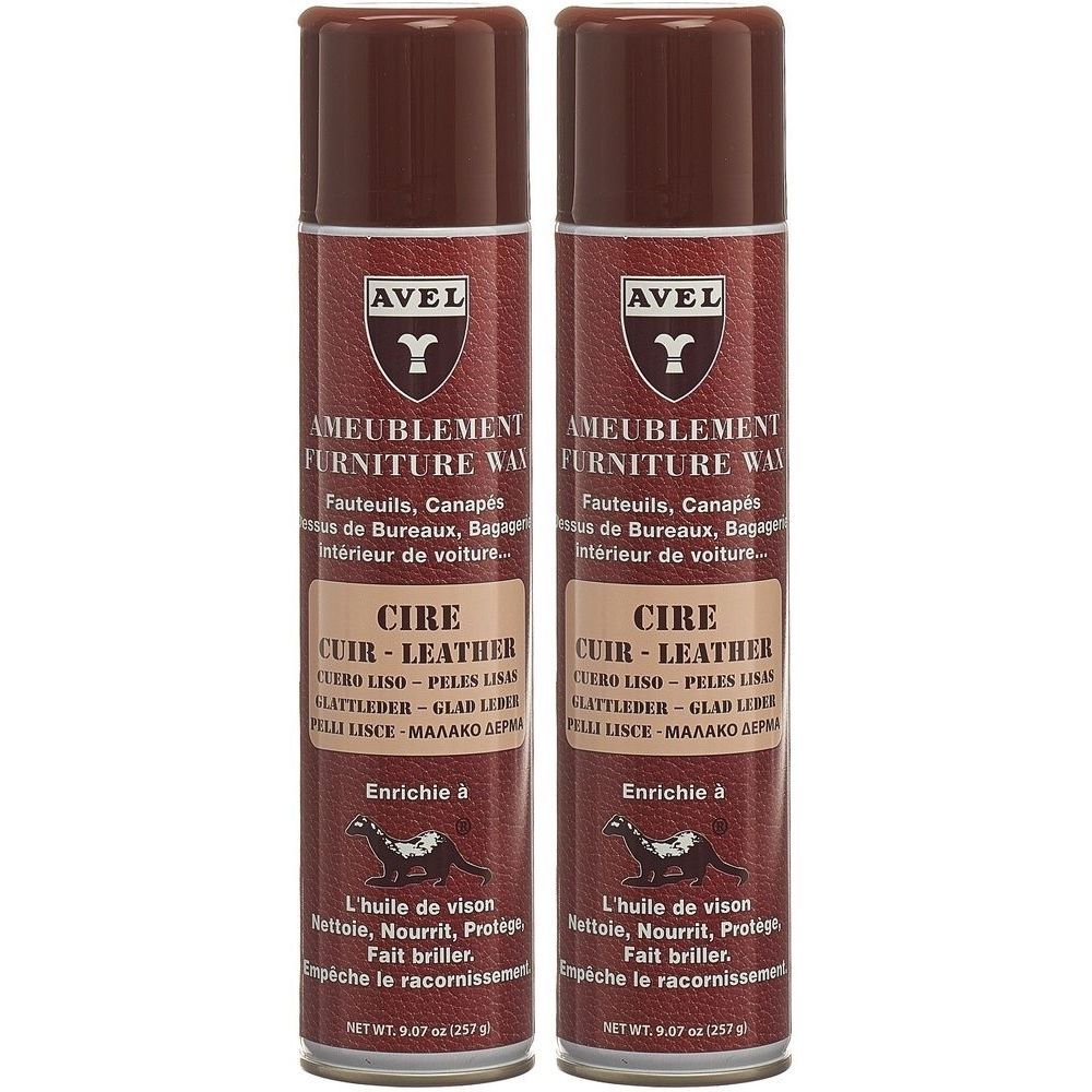 Twee bruine spuitbussen. Opschrift: AVEL, meubelwas, leerverzorging. Bevat nertsolie. Geschikt voor leer.