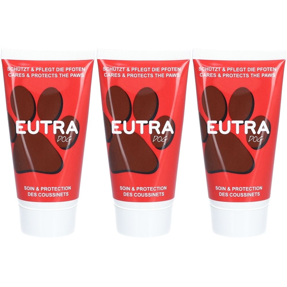 Drie rode tubes met bruine pootafdrukken en de tekst EUTRA DOG. Verzorging & bescherming van hondenschoenen.