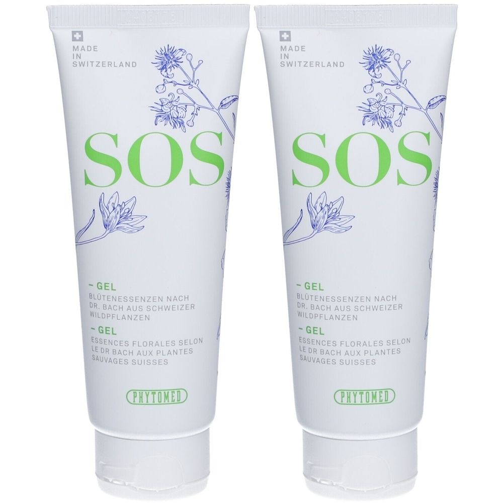Twee witte tubes met groene tekst SOS en bloemenillustraties. Tekst: Gel, Bachbloesems, Phytomed, Made in Switzerland.