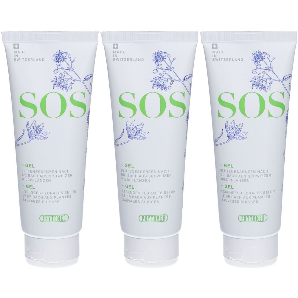 Drie tubes SOS-gel. Witte tubes met groene tekst "SOS" en bloemenillustraties. "Made in Switzerland" en "Phytomed" zichtbaar.