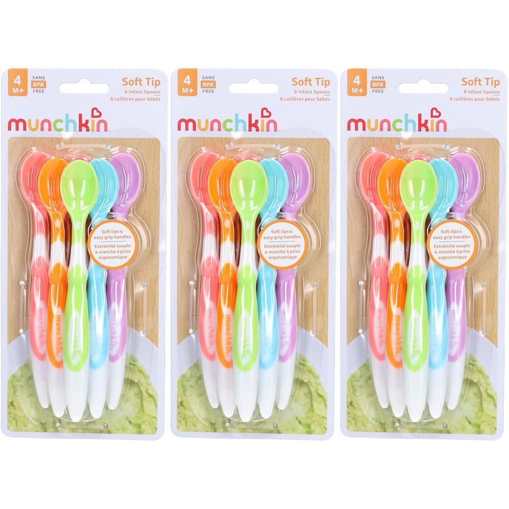Vier Munchkin Soft Tip lepels voor baby's in pastelkleuren met zachte uiteinden en ergonomische handgrepen.