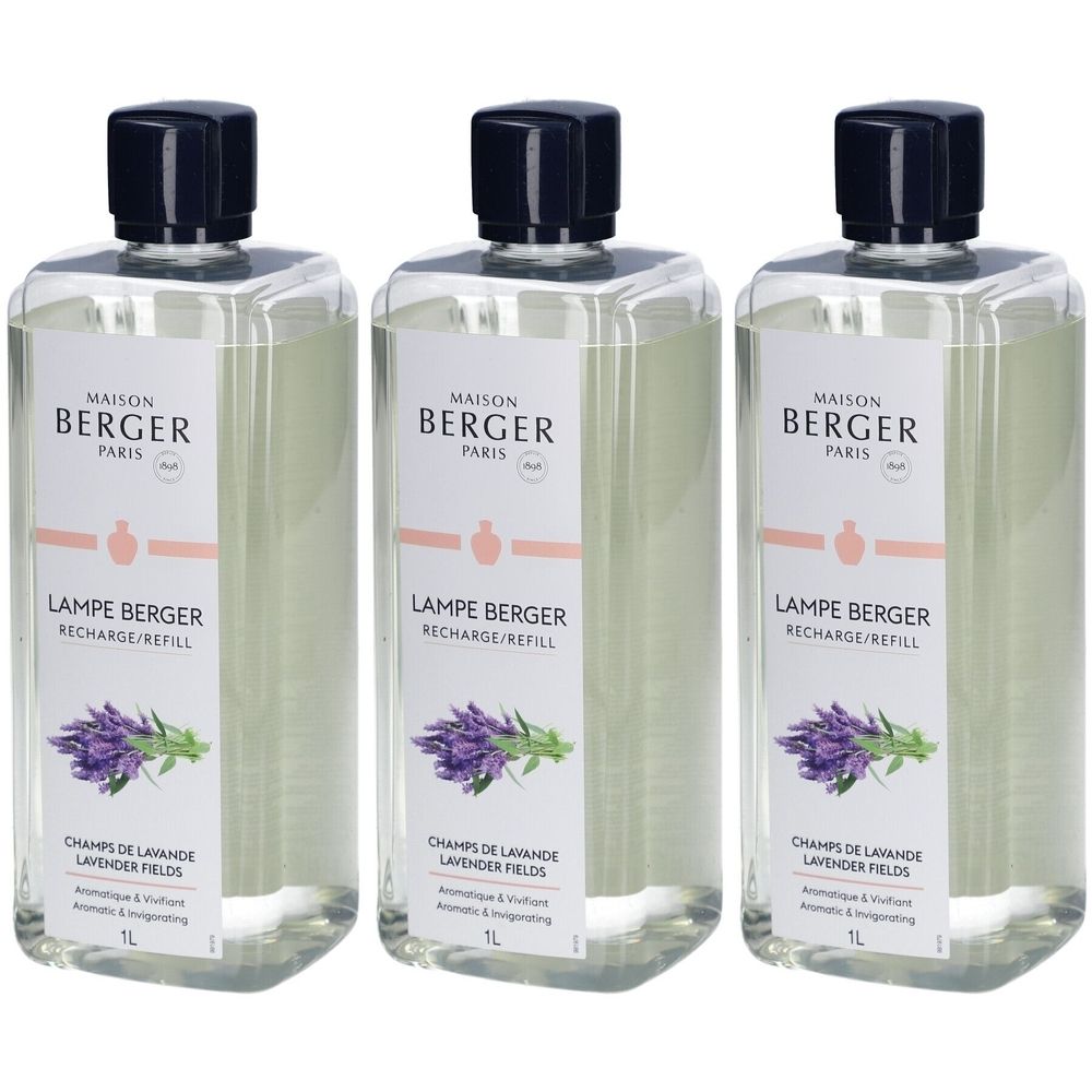 Trois flacons Maison Berger Paris. Inscription: Lampe Berger, Champs de Lavande, 1L. Bouchon noir, flacon transparent.